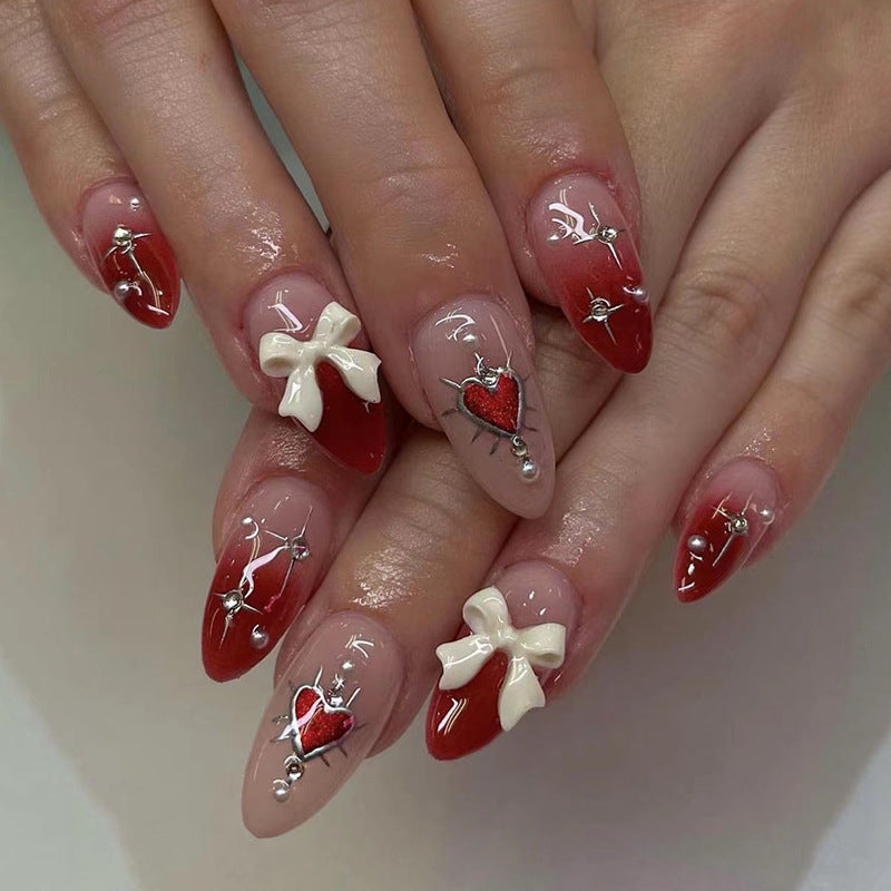 Artistic Heart-Themed Nail Art Extensions Bowlift