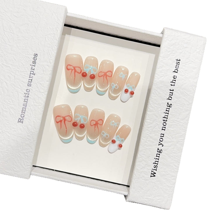 Artificial nail tips with romantic bow and cherry motifs Bowlift