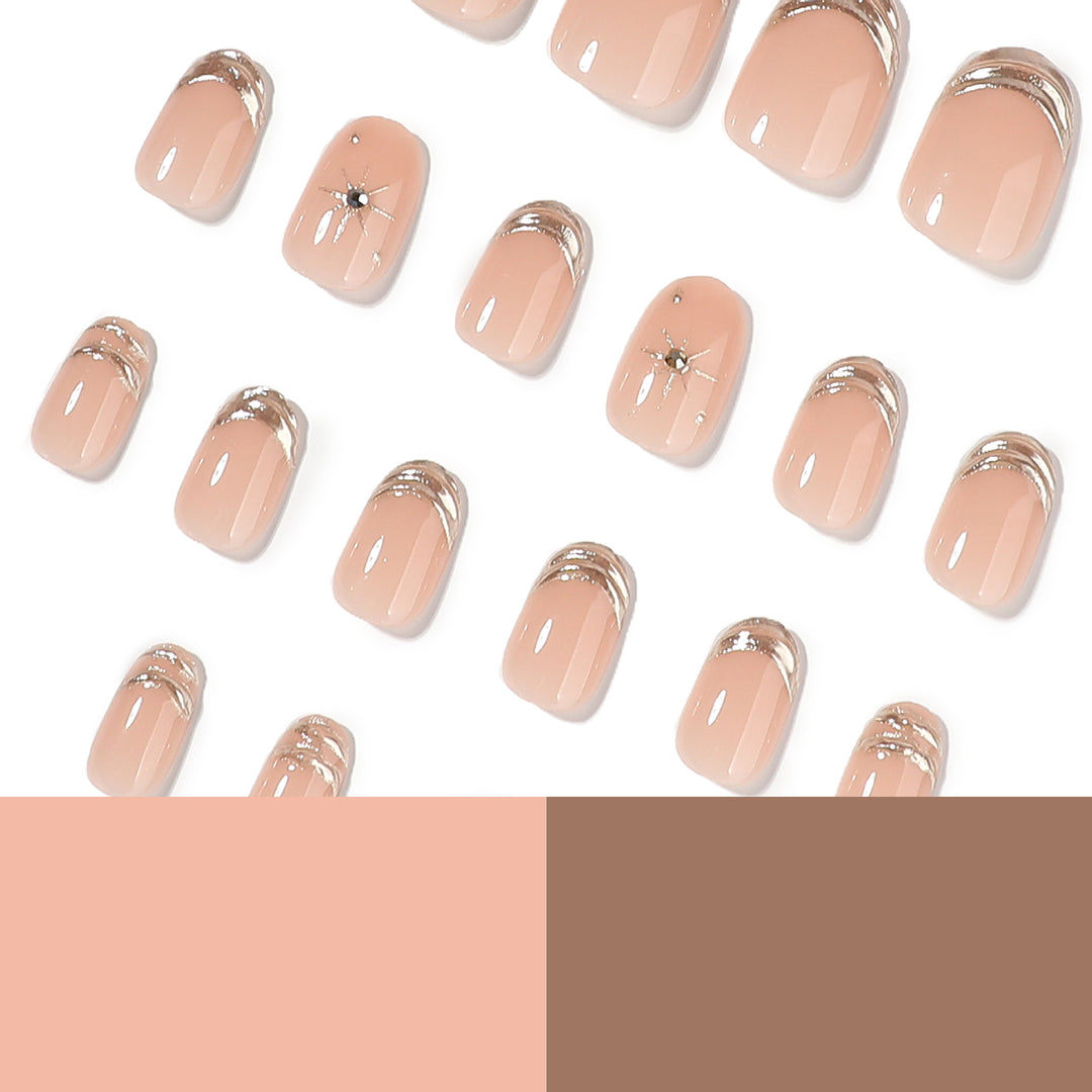 Glamorous nail extensions with elegant metallic accents Bowlift