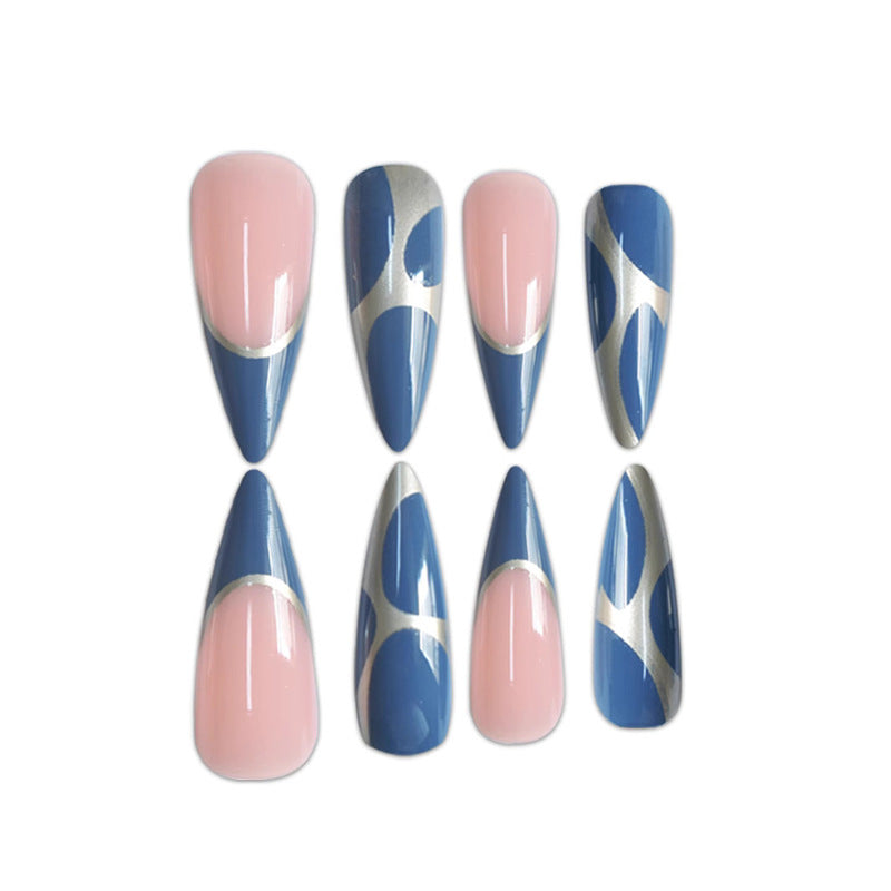 Artistic Stiletto Press-On Nail Design with Metallic Trim Bowlift