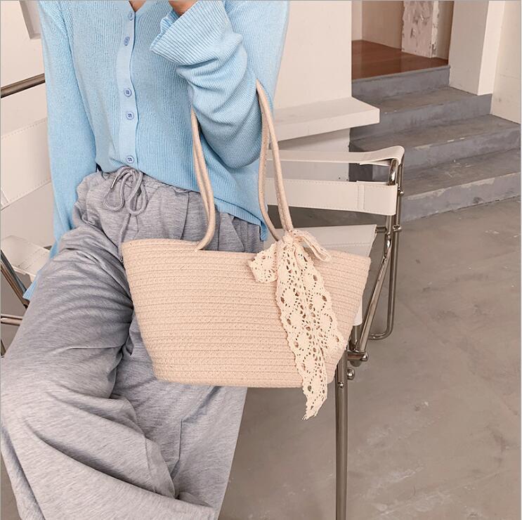 Elegant Bast Handbag with Lace Accent Bowlift