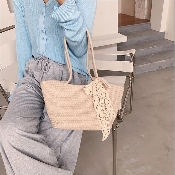 Elegant Bast Handbag with Lace Accent Bowlift