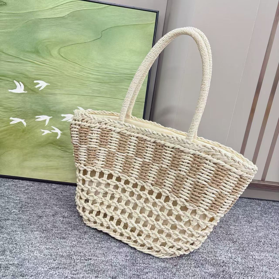 Braided beach bag with airy mesh structure Bowlift