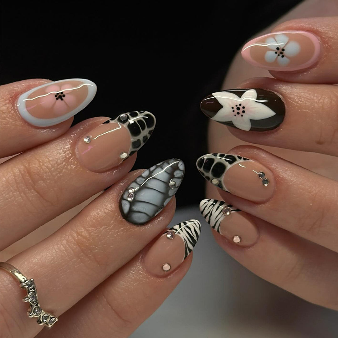 Nail art with elegant designs and embellishments Bowlift