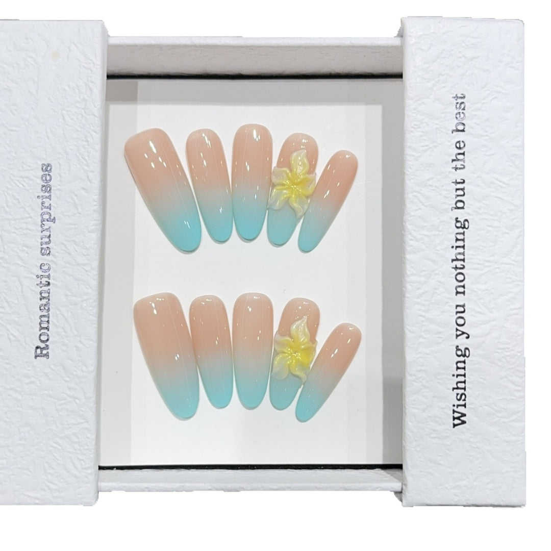 Artificial nails with enchanting ombre effect and floral accents Bowlift