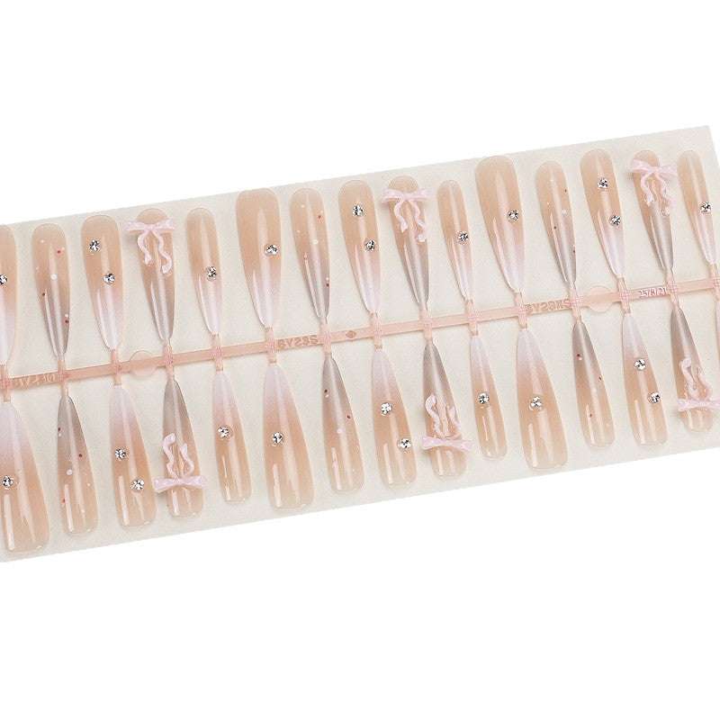 Elegant Stiletto Press-On Nails with Decorative Bow and Rhinestone Accents Bowlift