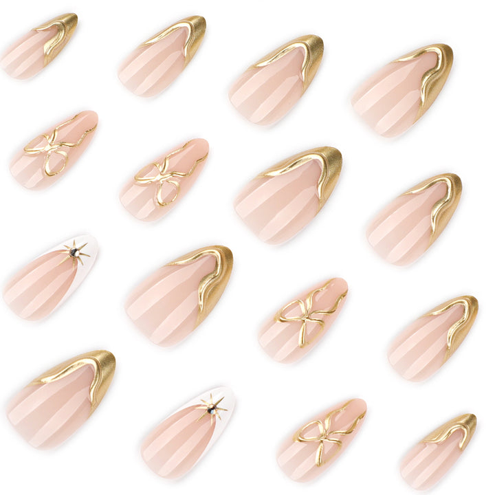 Artistic stiletto nails with elegant gold accents Bowlift