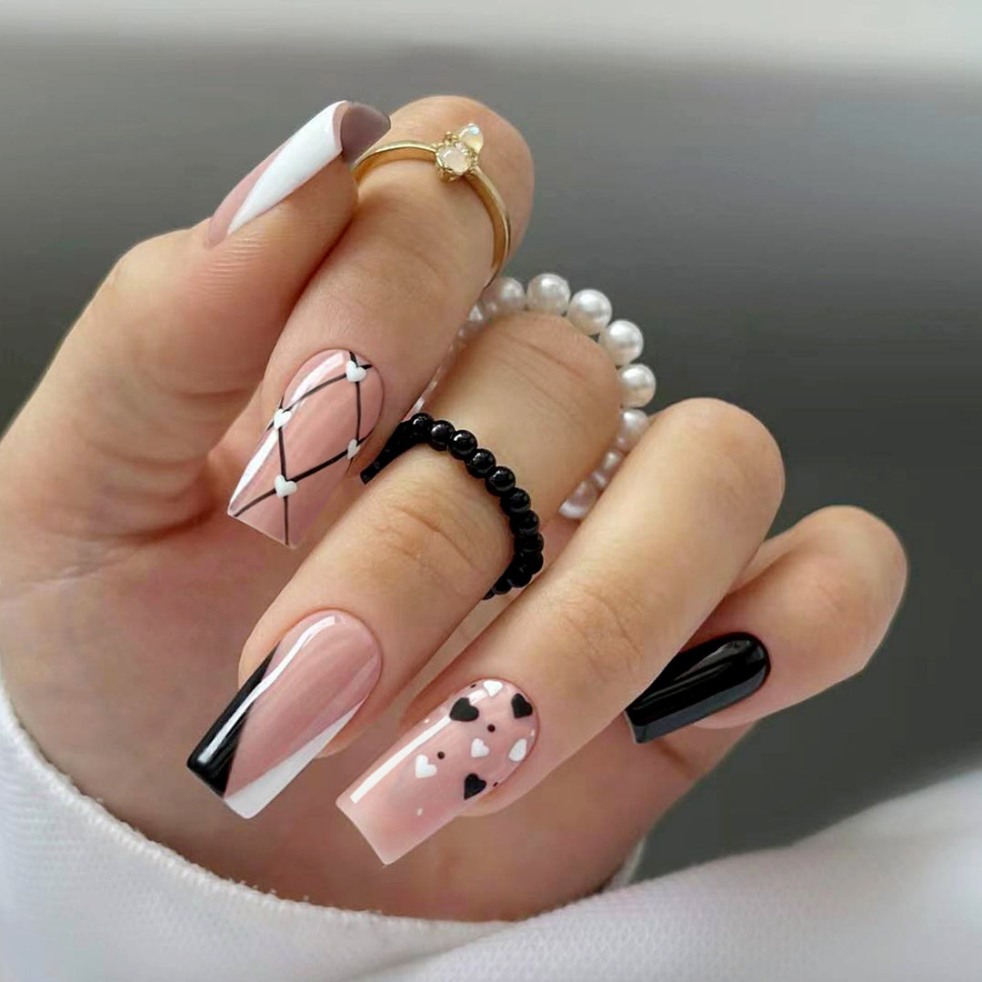 Artful nail art with heart patterns Bowlift