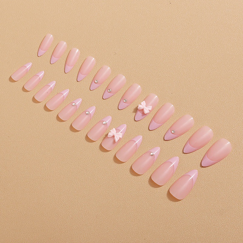 Glamorous nail art with bow detail Bowlift