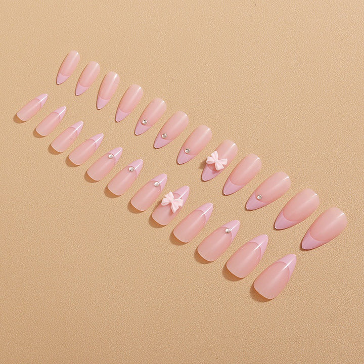 Glamorous nail art with bow detail Bowlift