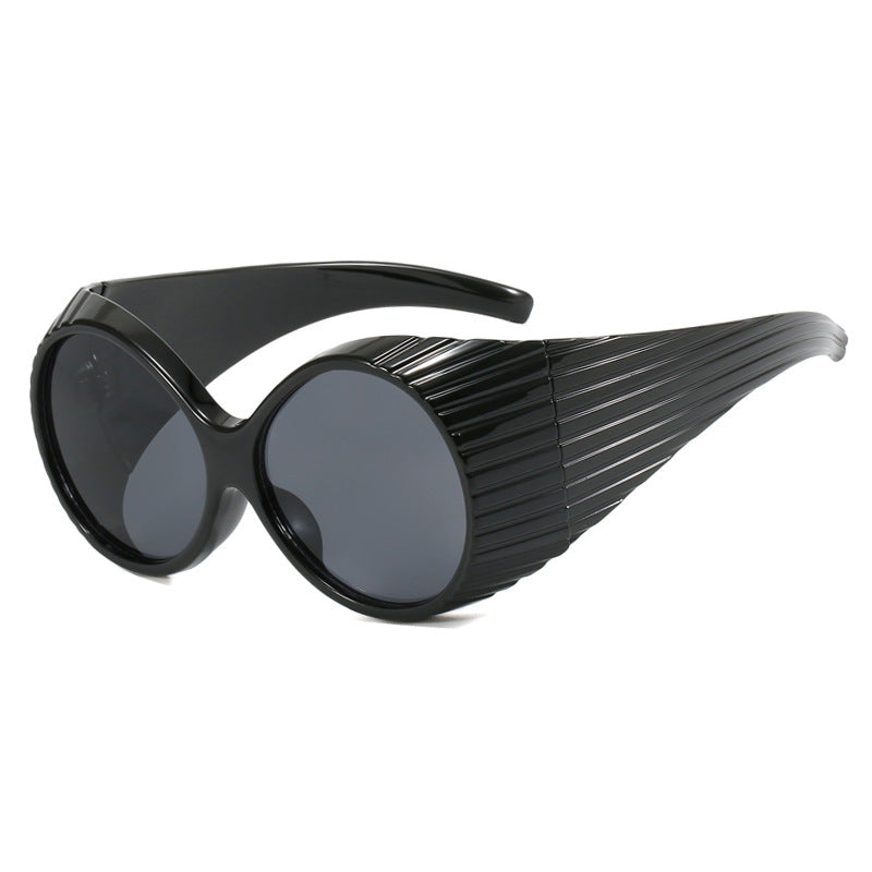 Women's extravagant sunglasses with curved frame Bowlift