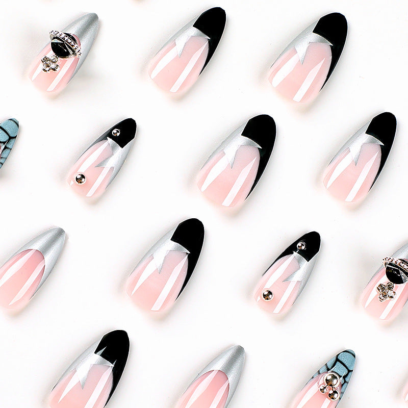 Artful acrylic nails with elegant 3D decorations and glitter effects Bowlift