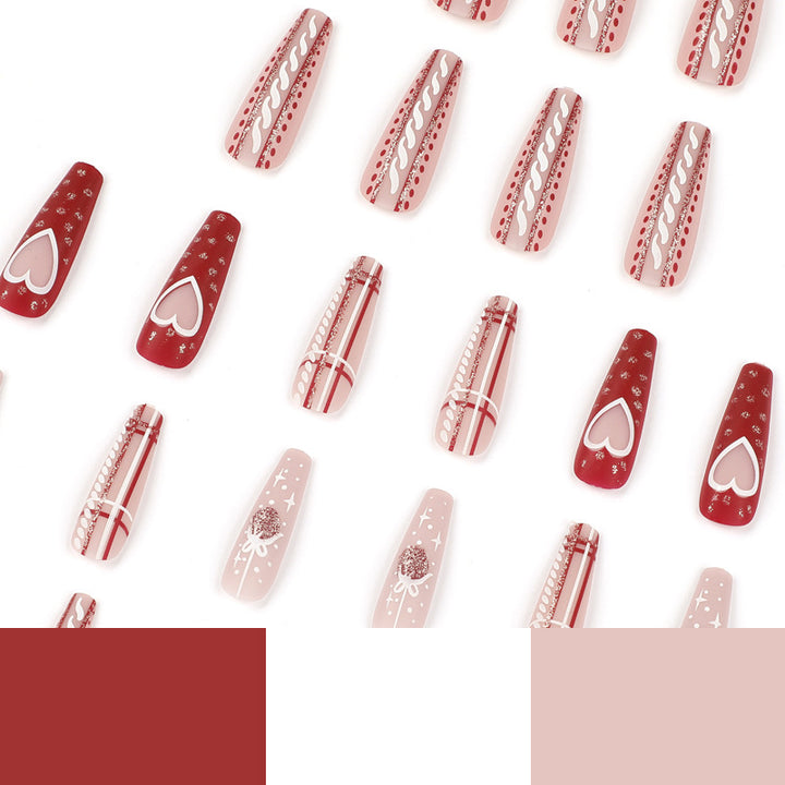 Artful nail art in festive design with heart and Christmas motifs Bowlift