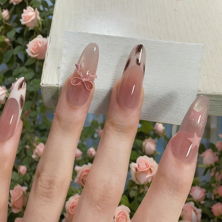 Artistic Press-On Nails with Bow and Star Accents Bowlift