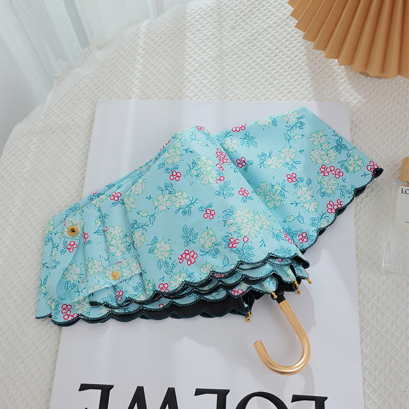 Women's elegant automatic folding umbrella with floral details Bowlift