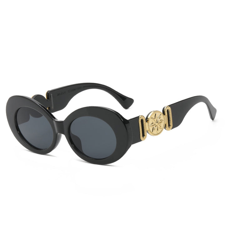 Ladies fashionable sunglasses with striking golden accents Bowlift