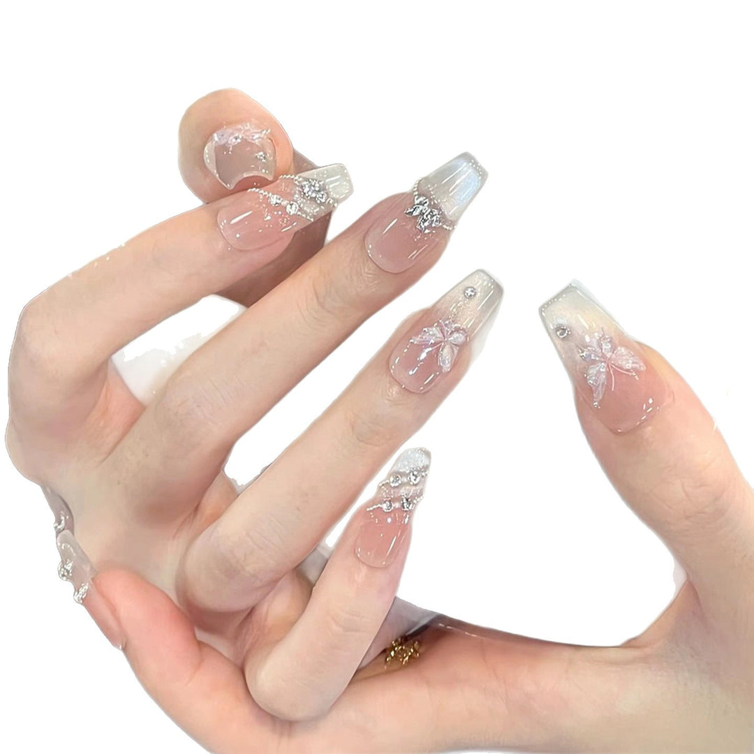 Decorative Long Stiletto Press-On Nails with Heart and Floral Accents Bowlift
