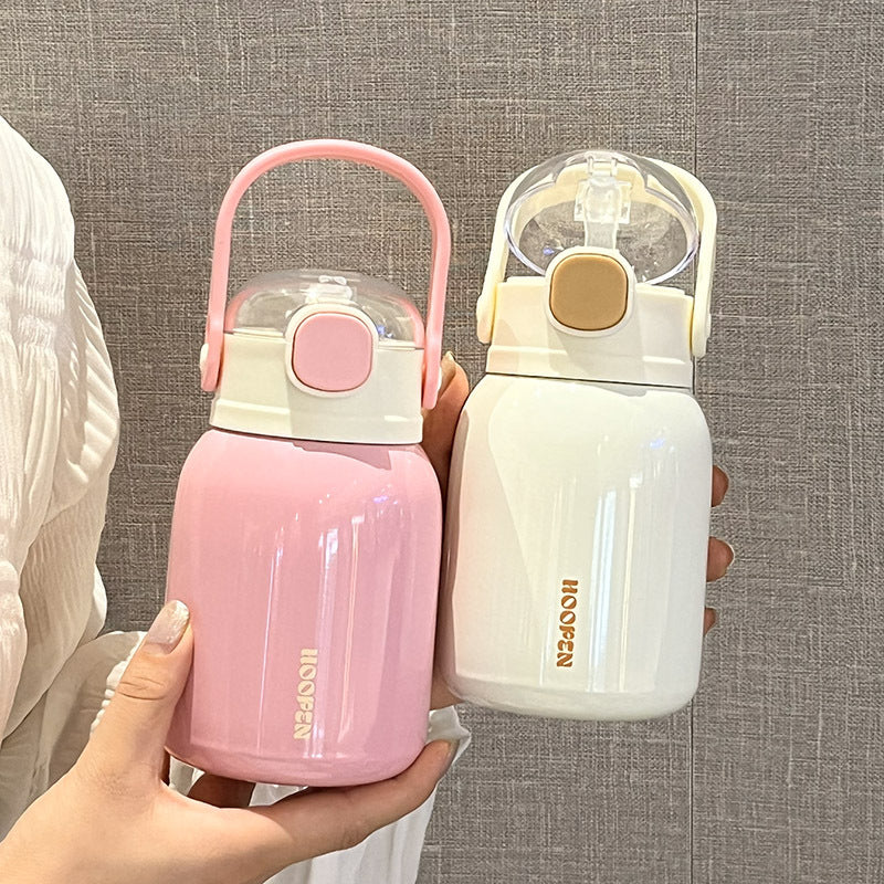 Women's insulated drinking container with practical carrying handle and cute design Bowlift