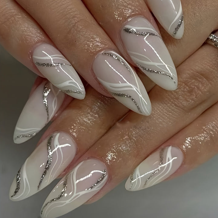 Elegant artificial nails with glitter accents Bowlift