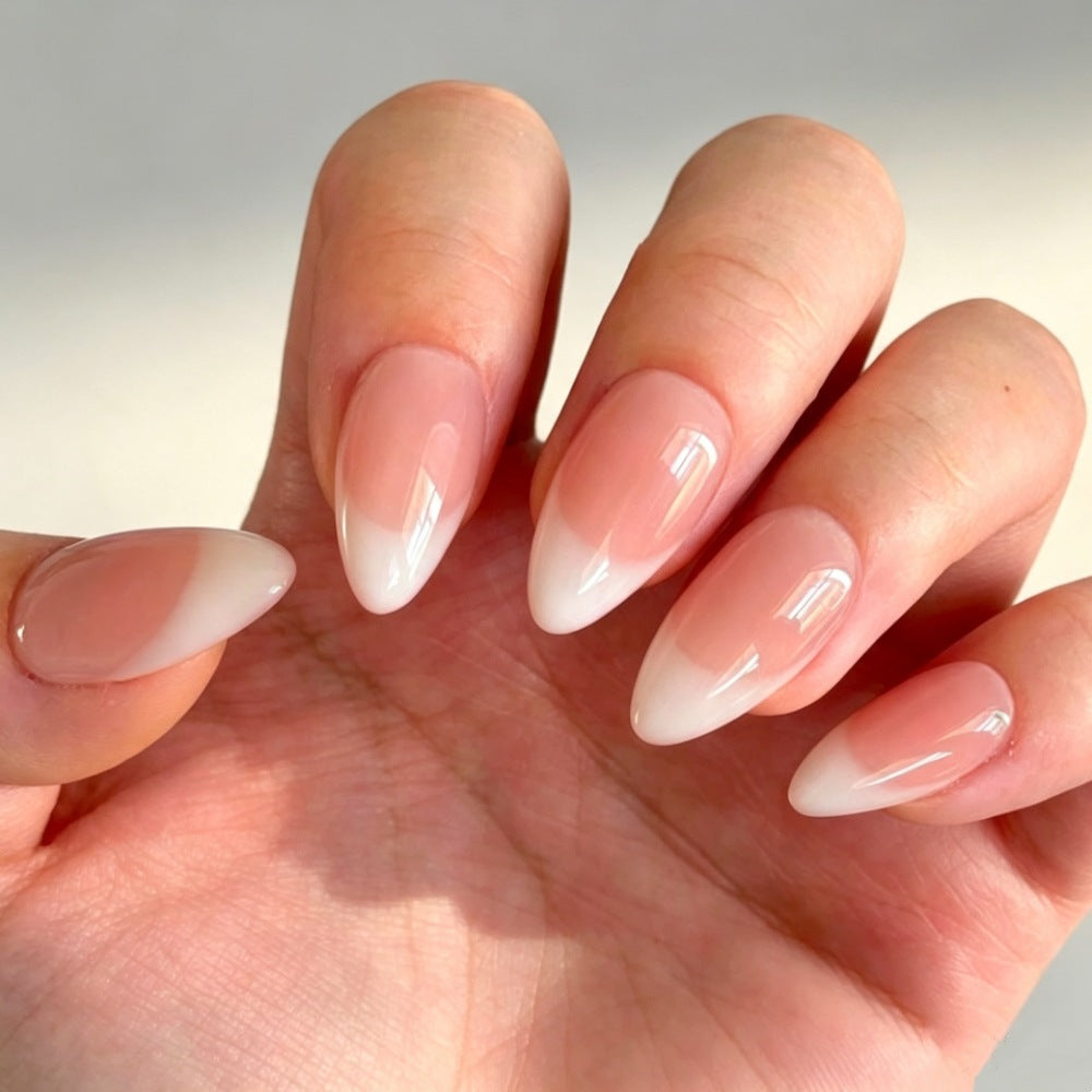 Artificial nails in elegant French-tip design Bowlift