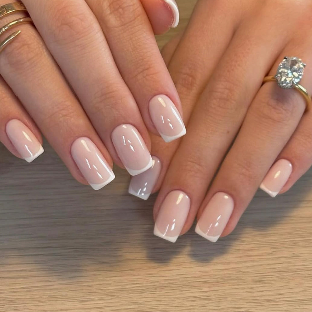 Classic nail extensions with elegant French tips Bowlift