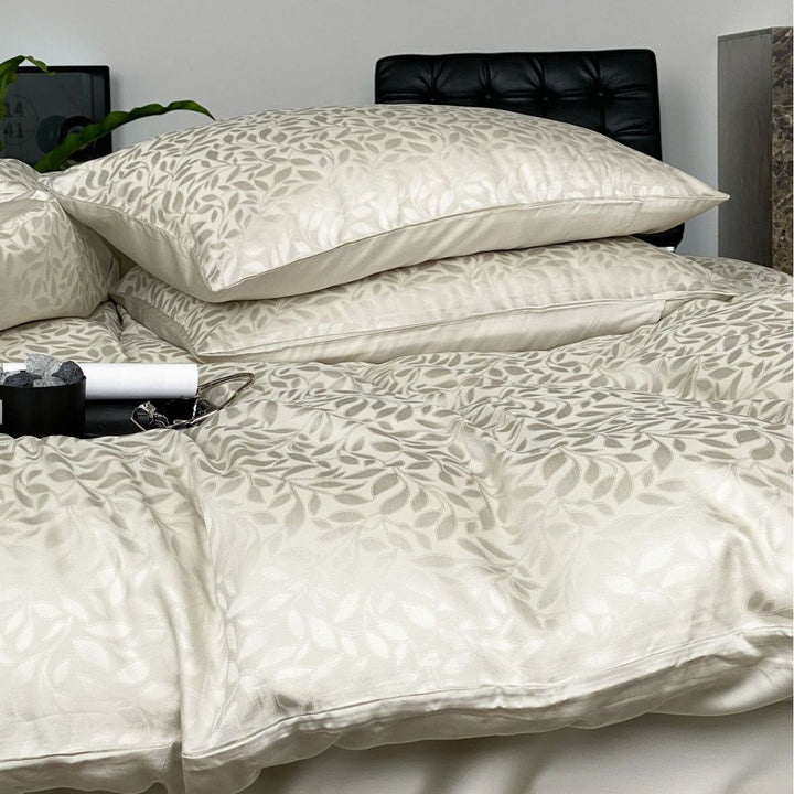 Satin bedding set with subtle leopard jacquard texture and silky feel