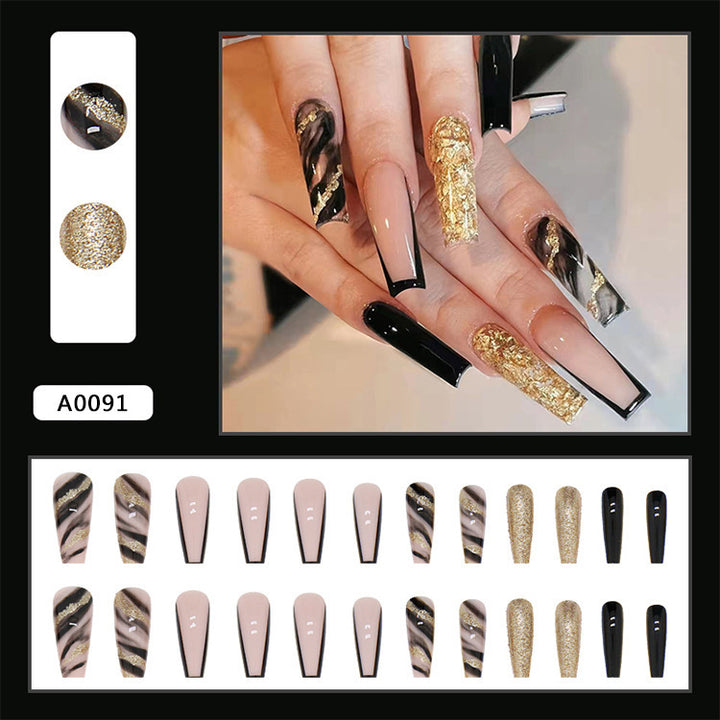 Acrylic nail set with luxurious golden accents and elegant designs Bowlift