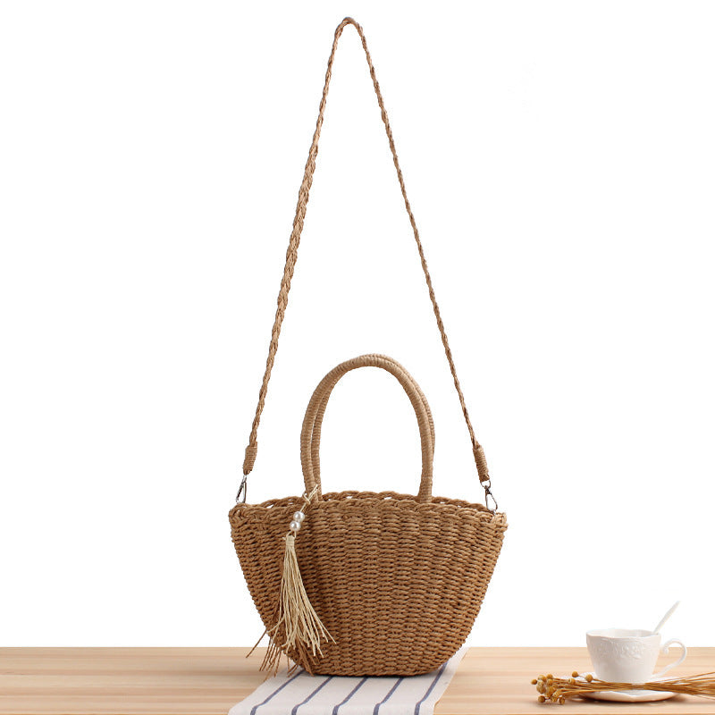 Fashionable basket bag with elegant tassel design Bowlift