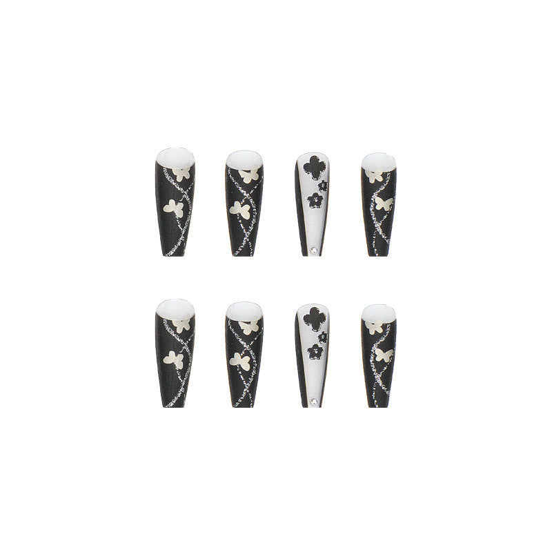 Art nail set with elegant butterfly and flower motifs Bowlift