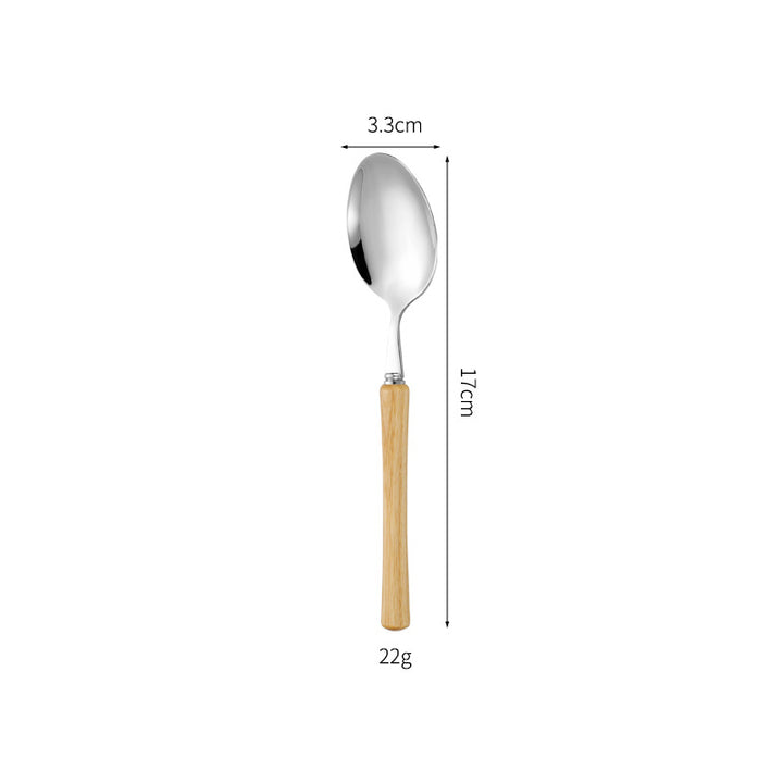 Elegant serving spoon with ergonomic wooden handle Bowlift