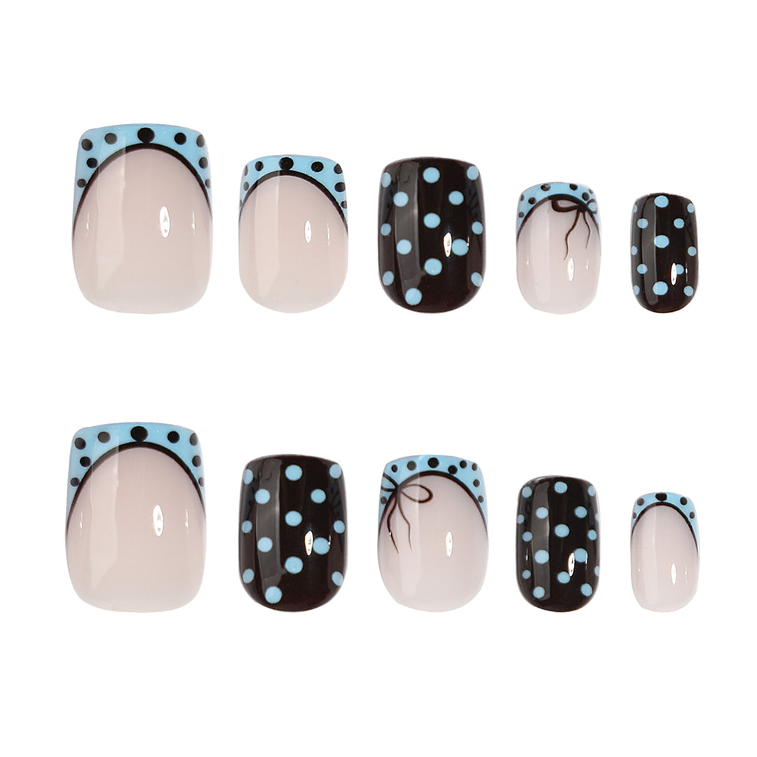 Artful nail extensions with playful dots and elegant design Bowlift