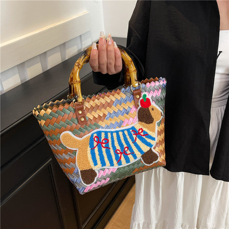 Shoulder bag with playful dog motif Bowlift