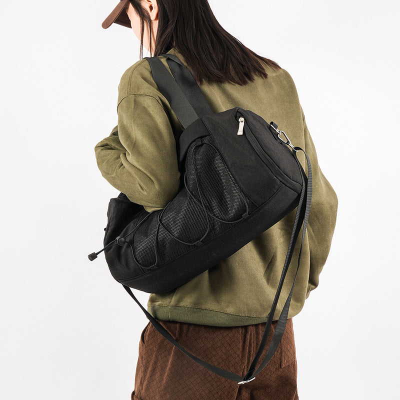Sporty shoulder bag with adjustable carrying handles and breathable mesh material Bowlift