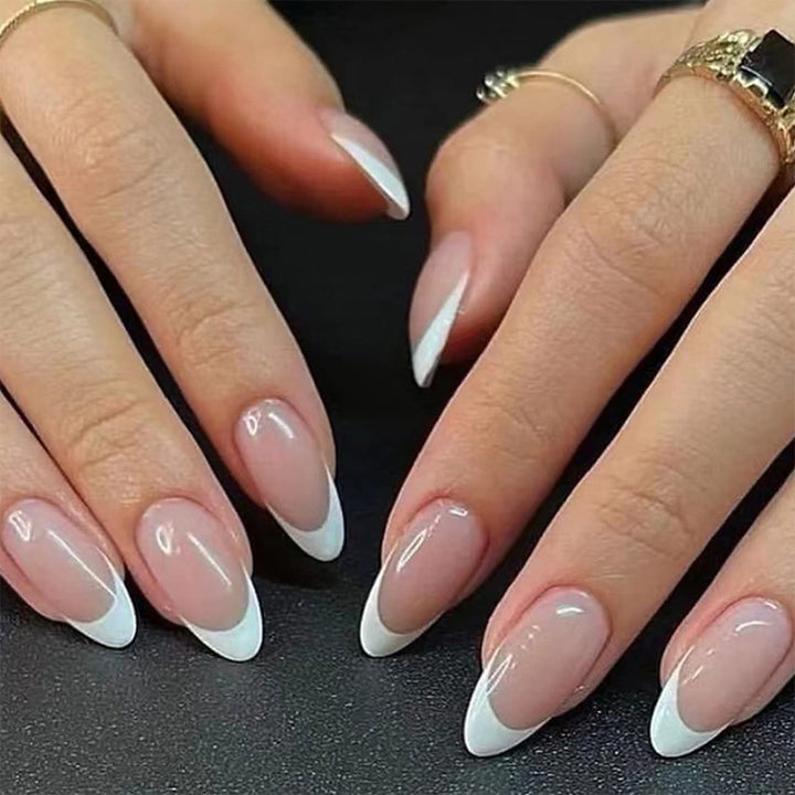Stiletto artificial nails with elegant French design Bowlift