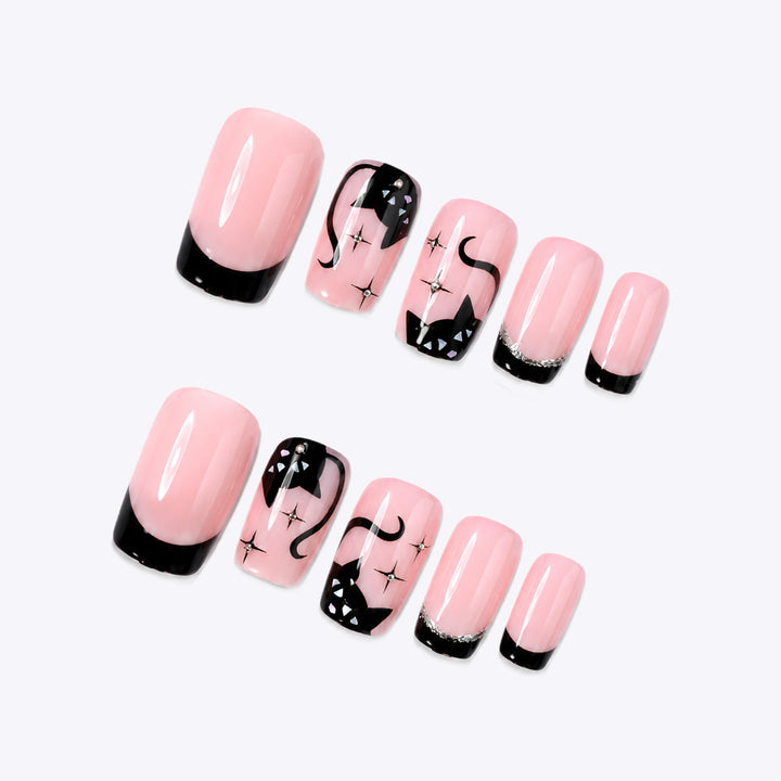 Creative nail set with cat design and glitter details Bowlift