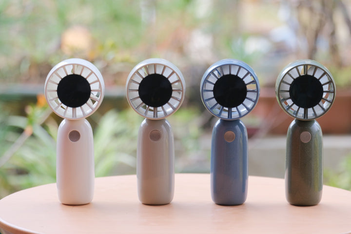 Unisex Portable Handheld Fan with Powerful Battery and Compact Design Bowlift