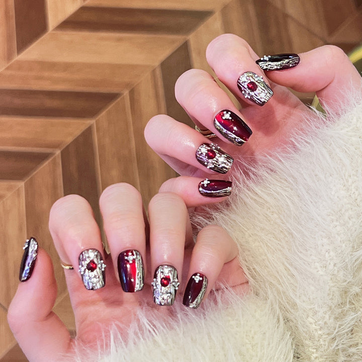 Artistic artificial nails in elegant design with glitter accents Bowlift