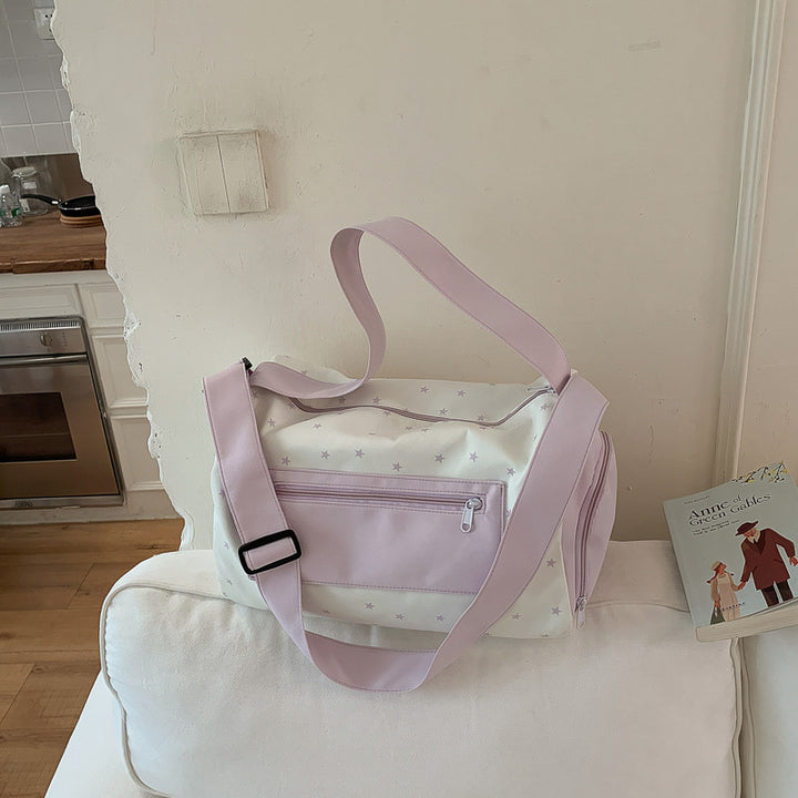 Sporty shoulder bag with practical slip pockets Bowlift