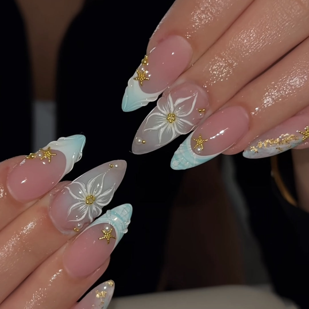 Artful stiletto nails with floral and glamorous accents Bowlift