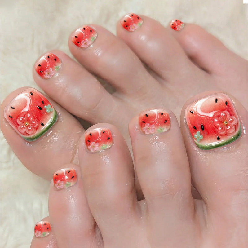 Creative nail art set with cheerful watermelon designs and delicate floral accents Bowlift