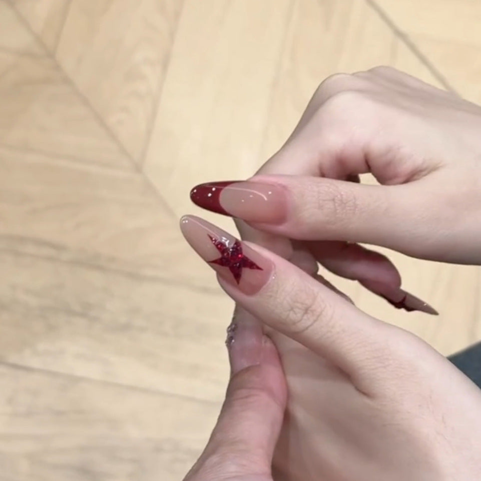 Fake nails with glitter star design Bowlift