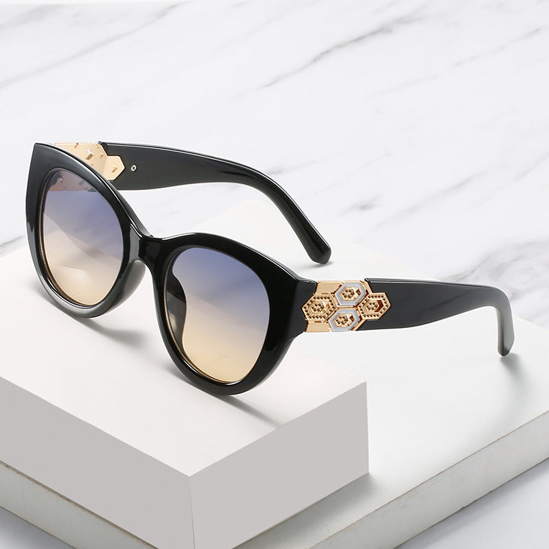 Fashion-Forward Cat-Eye Sunglasses with Decorative Accents Bowlift