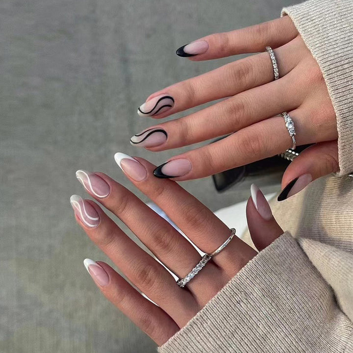 Elegant Artificial Nail Art with Curved Designs and Bowlift Accents