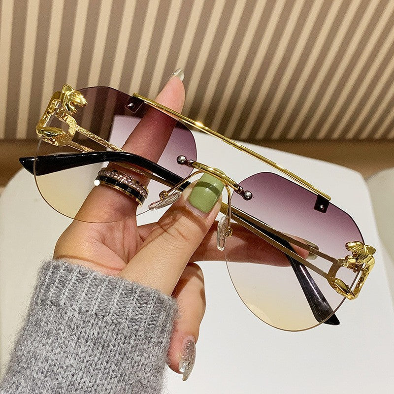 Women Designer Sunglasses with Unique Animal Accent Bowlift