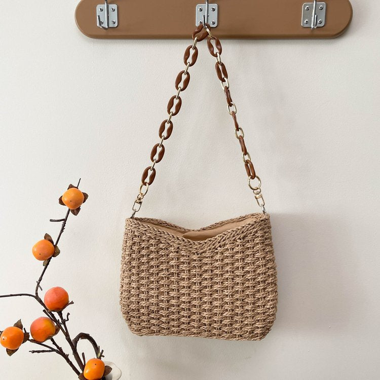 Handbag with chain carry handle Bowlift