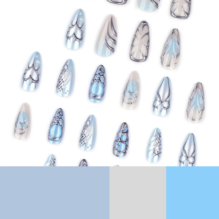 Artful stiletto nails with playful metallic details Bowlift