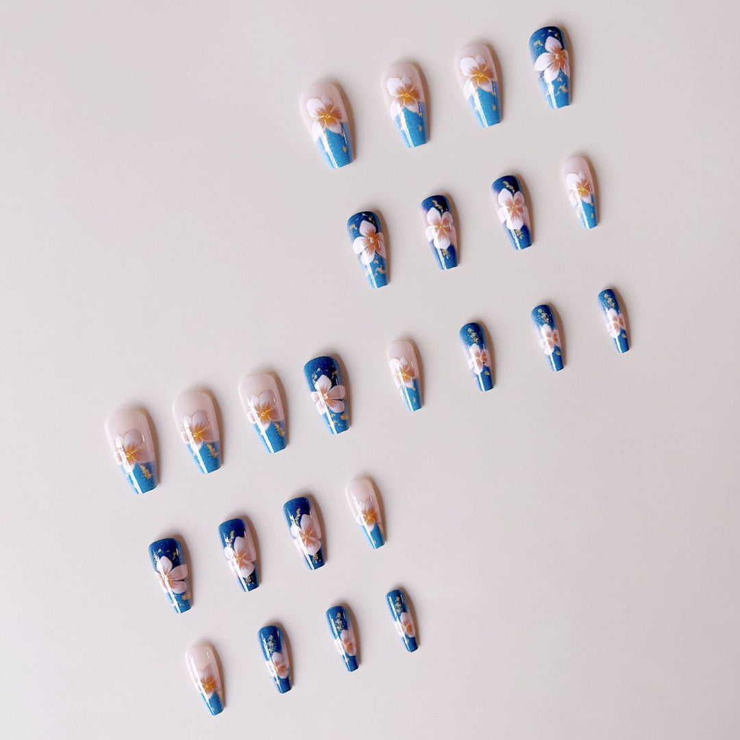 Artificial nail tips with floral accents and glitter Bowlift