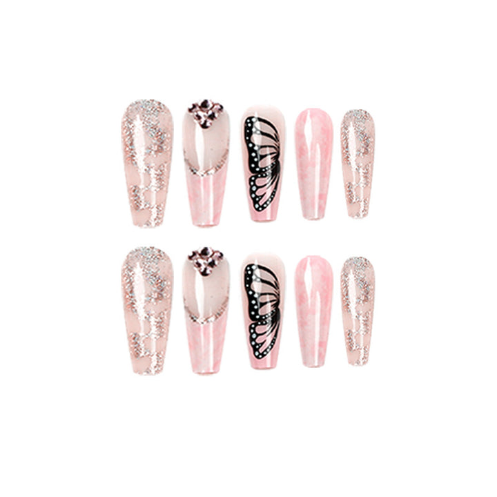 Glamorous nail extensions with beautiful butterfly motifs and glitter accents Bowlift