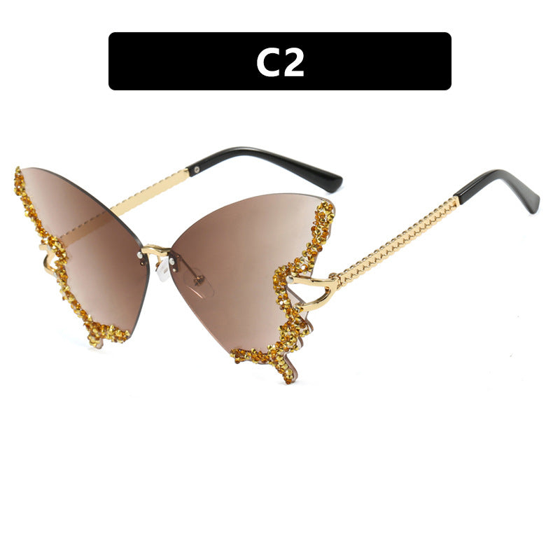 Women's large cat-eye sunglasses with sparkling rhinestone embellishment and elegant frame Bowlift