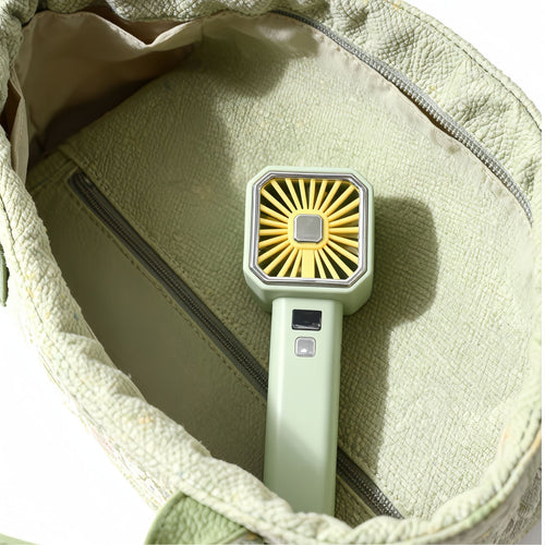 Unisex portable USB table fan with digital temperature display and compact folding grille Bowlift